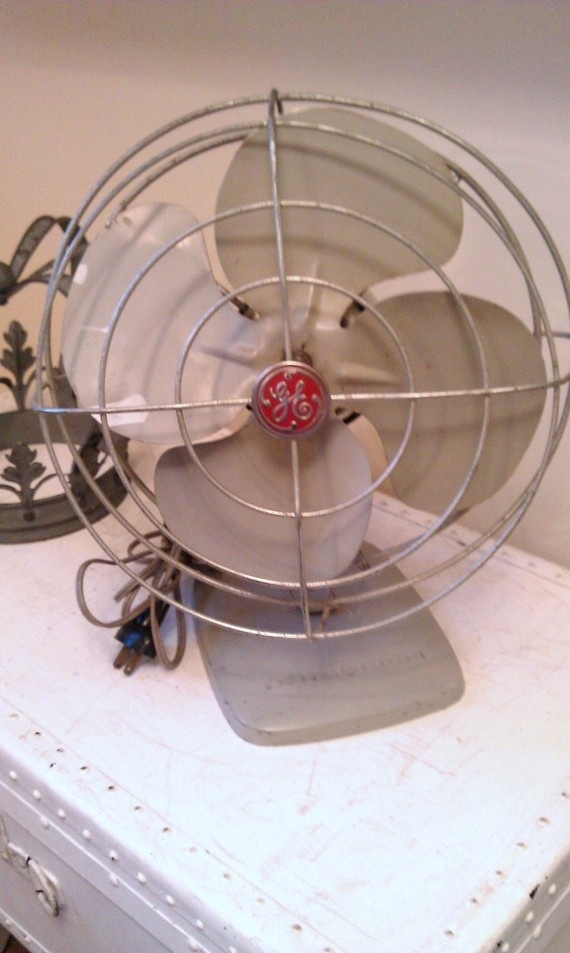 Vintage ge metal oscillating fan and it