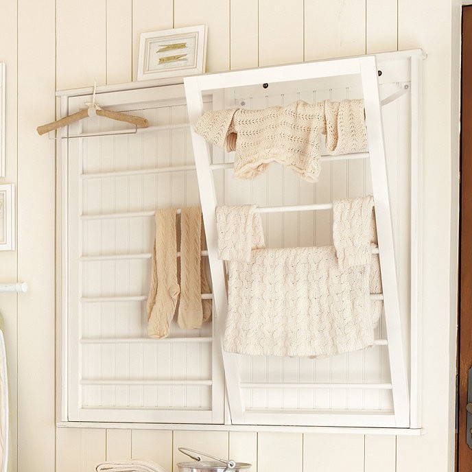 Wall mounted clothes rail