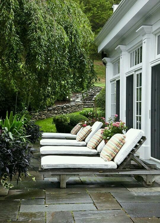 Love these rustic looking wood lounge chairs perfect for reading
