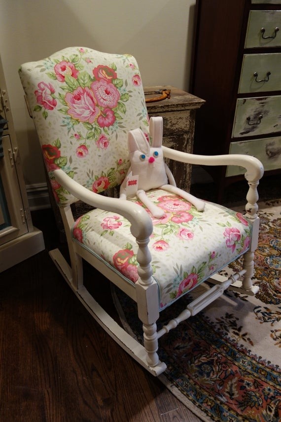 Antique rocking chair upholstered