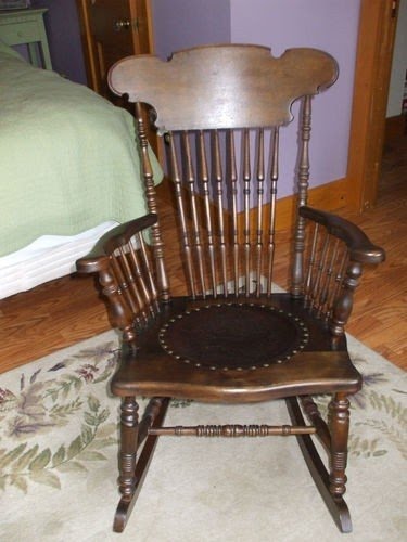 Antique rocking chair with original leather seat