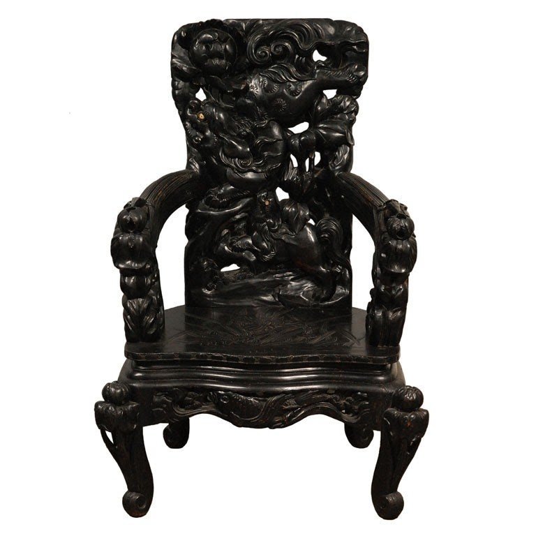 Antique large oriental carved arm chair