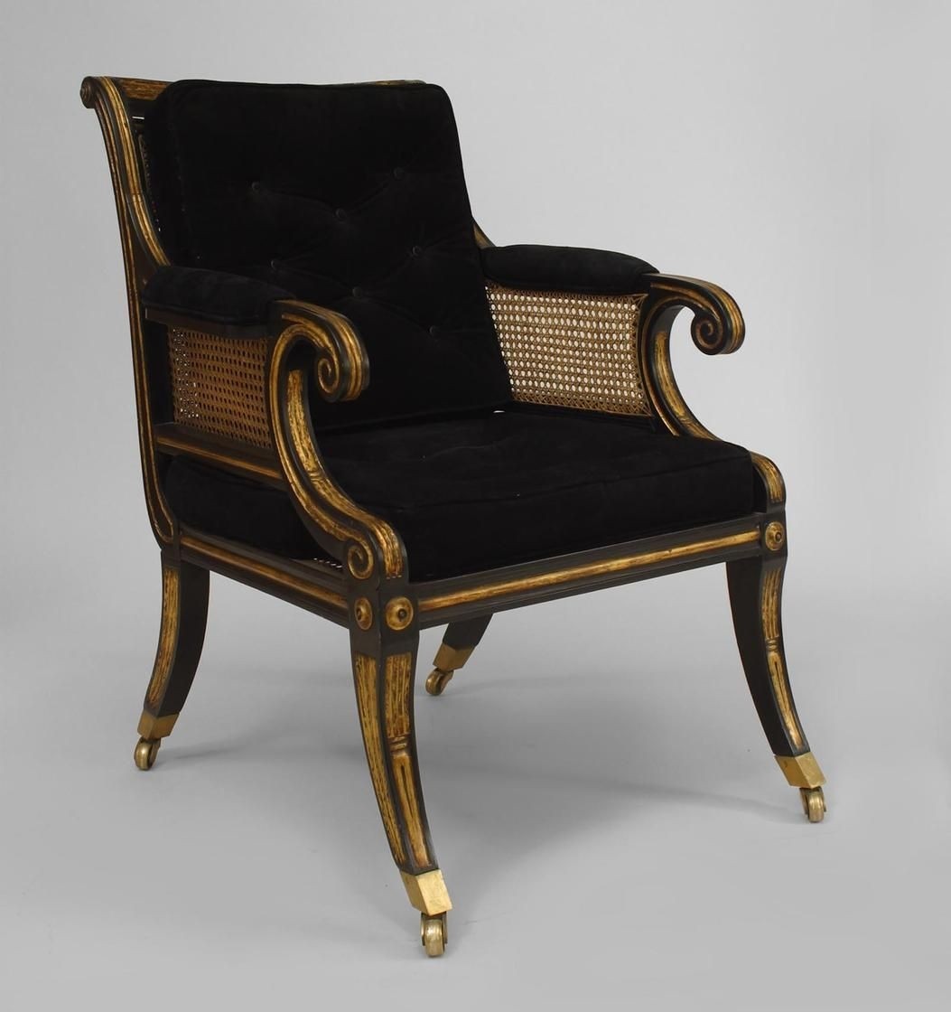 English regency style ebonized and gilt trimmed arm chairs with