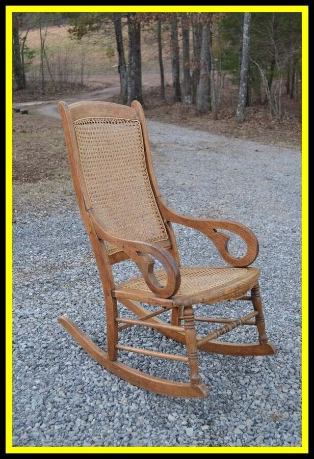 antique childs rocking chair with cane seat