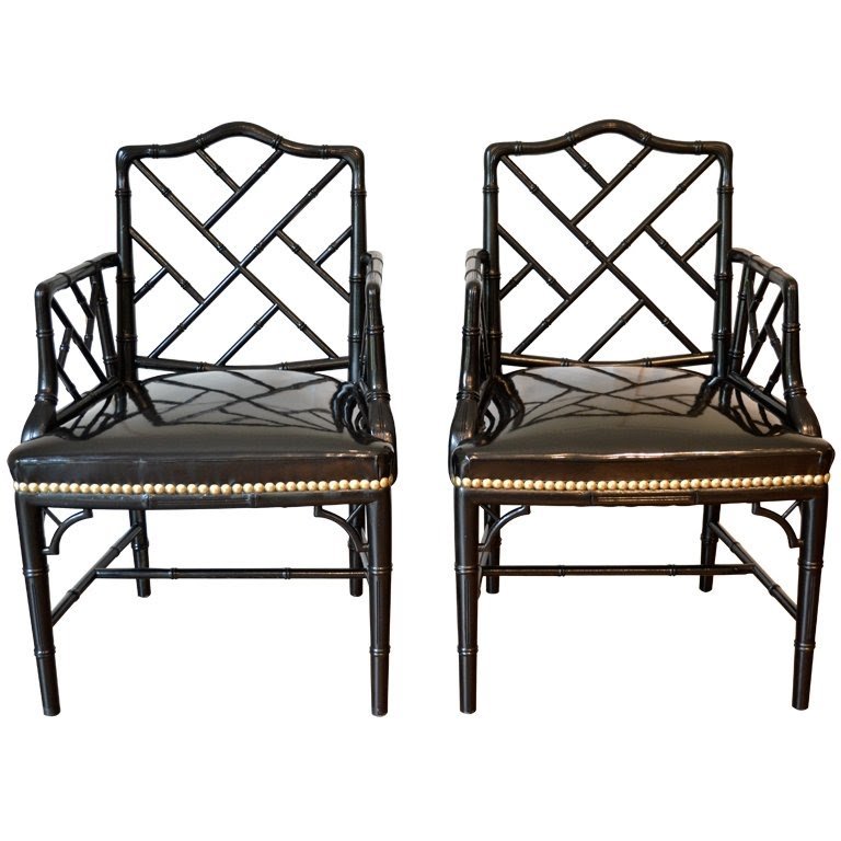 Pair of faux bamboo arm chairs