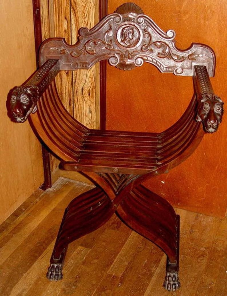 Savonarola folding chair hand carved with lions head arms