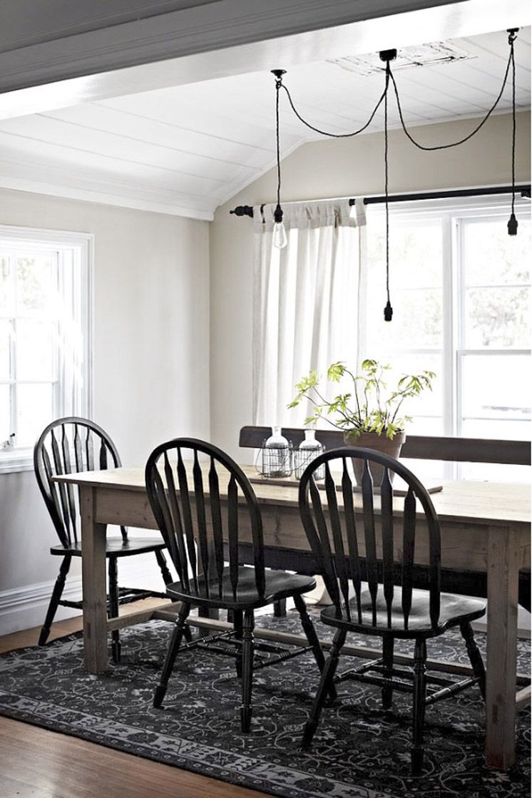Wood table black chairs