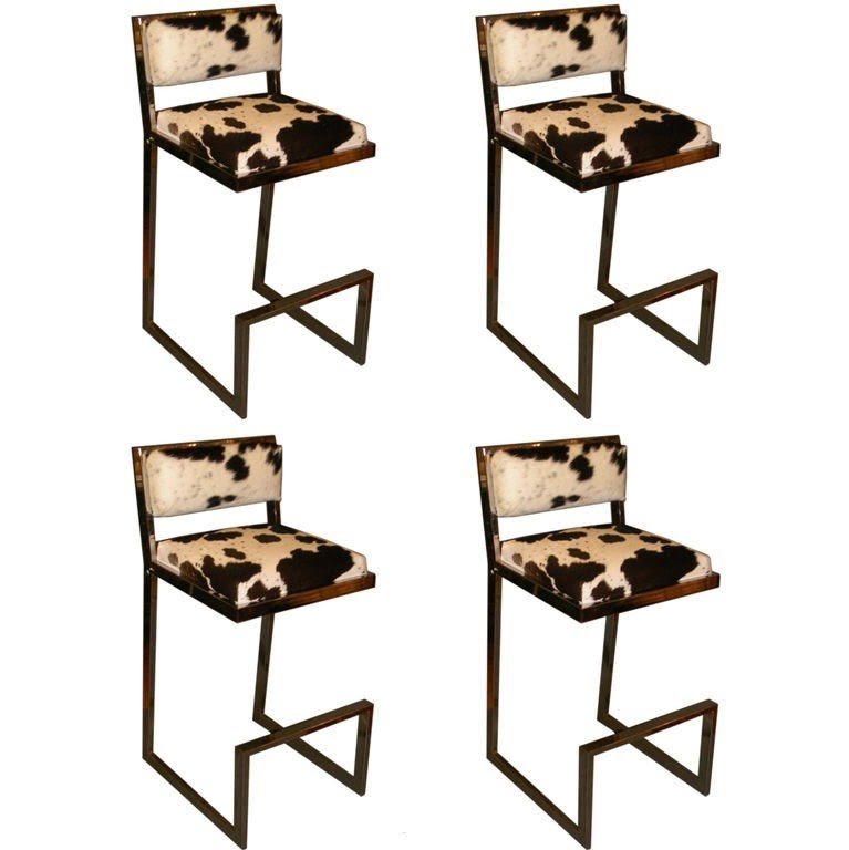 Set of four 1970s chrome cowhide bar stools