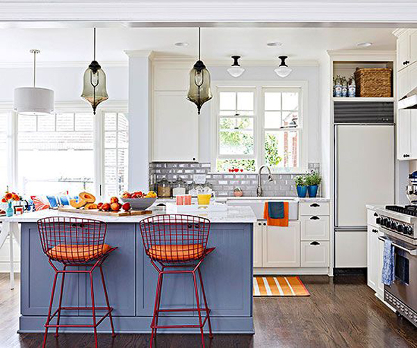 Wire frame barstools in this white kitchen with colorful accents