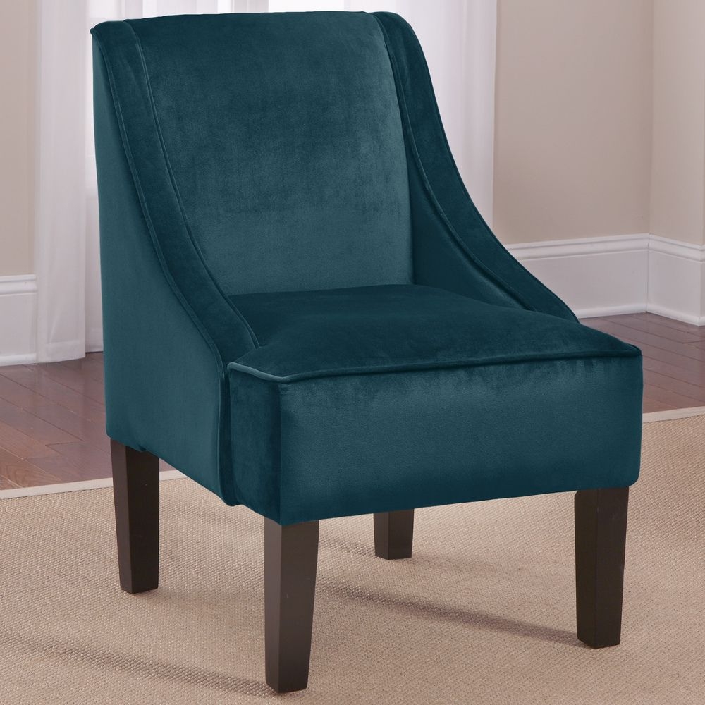 Narrow deep teal armchair shown skyline peacock swoop arm chair