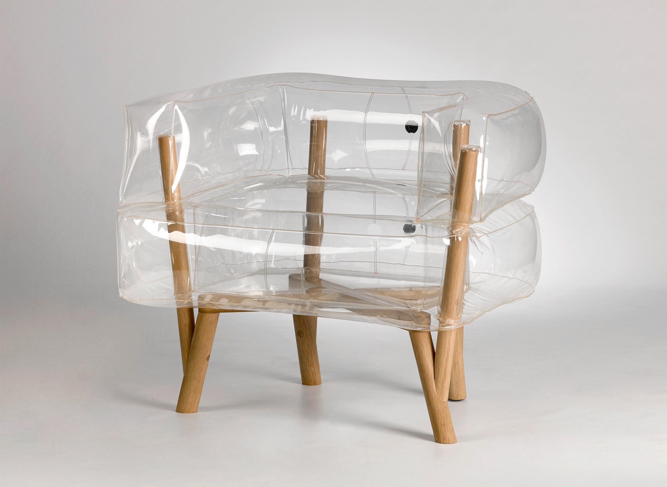An inflatable chair with a wooden base that rethinks the