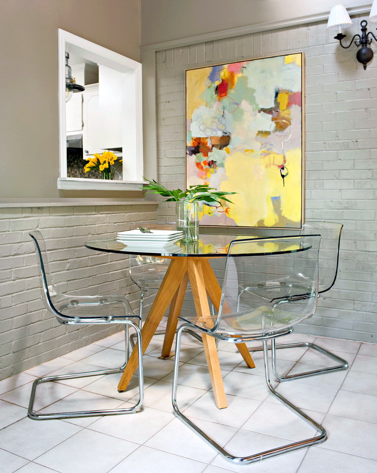 glass dining table with clear chairs