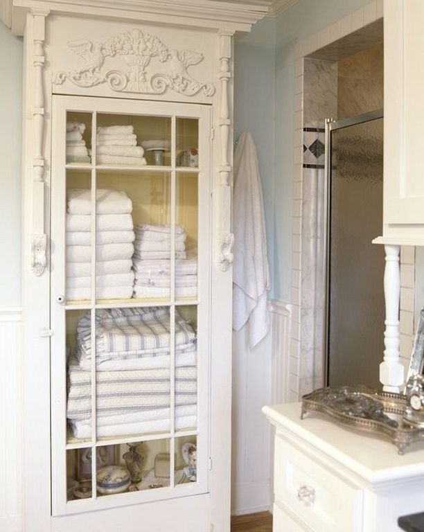 White bathroom linen cabinet 1