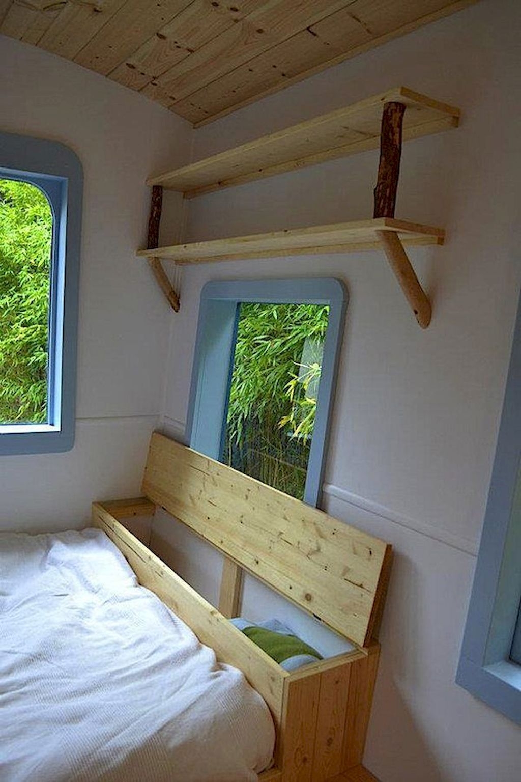 5 Micro Guest House Design Ideas - love the shelves and headboard storage! 