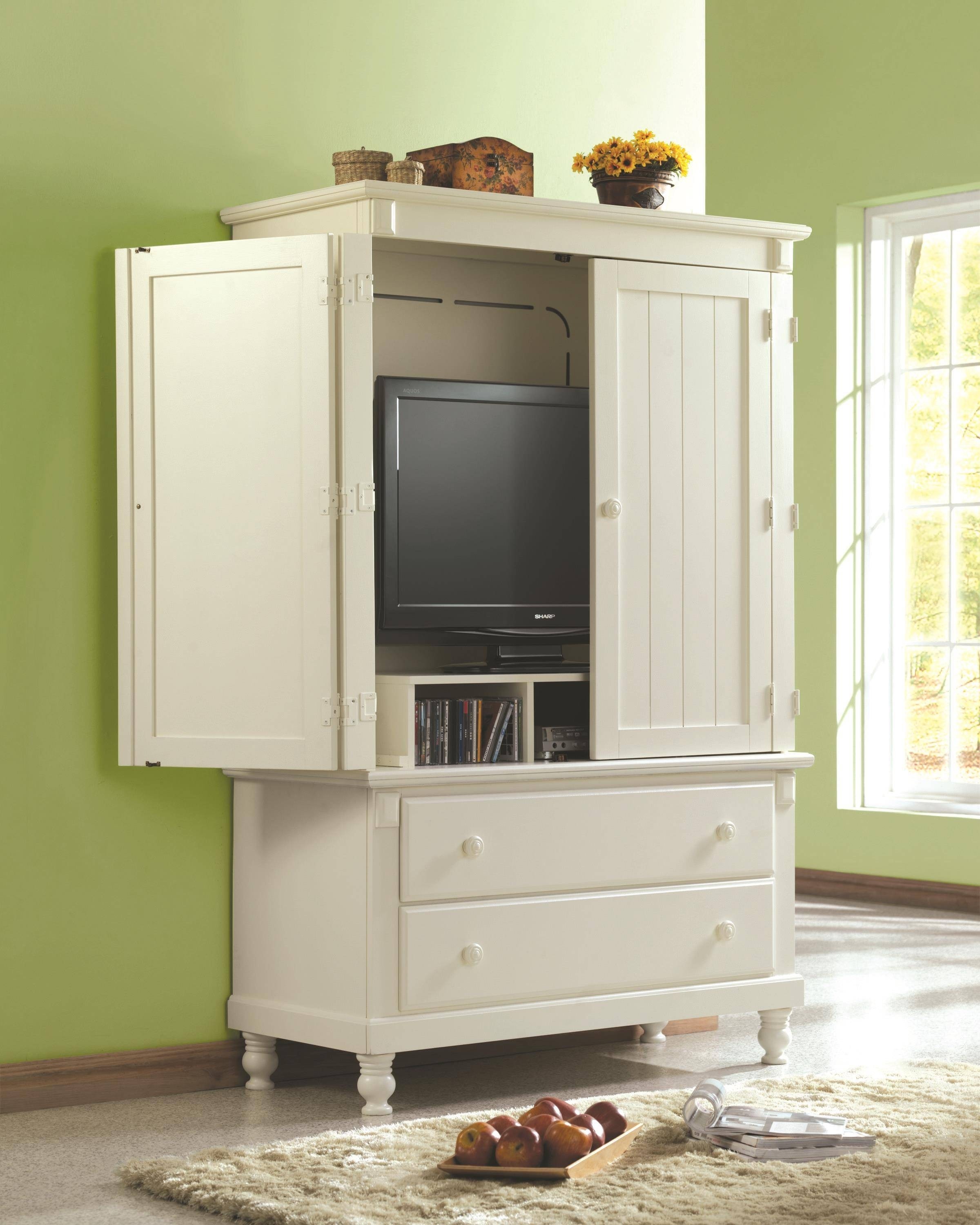 Media armoire with pocket outlet doors