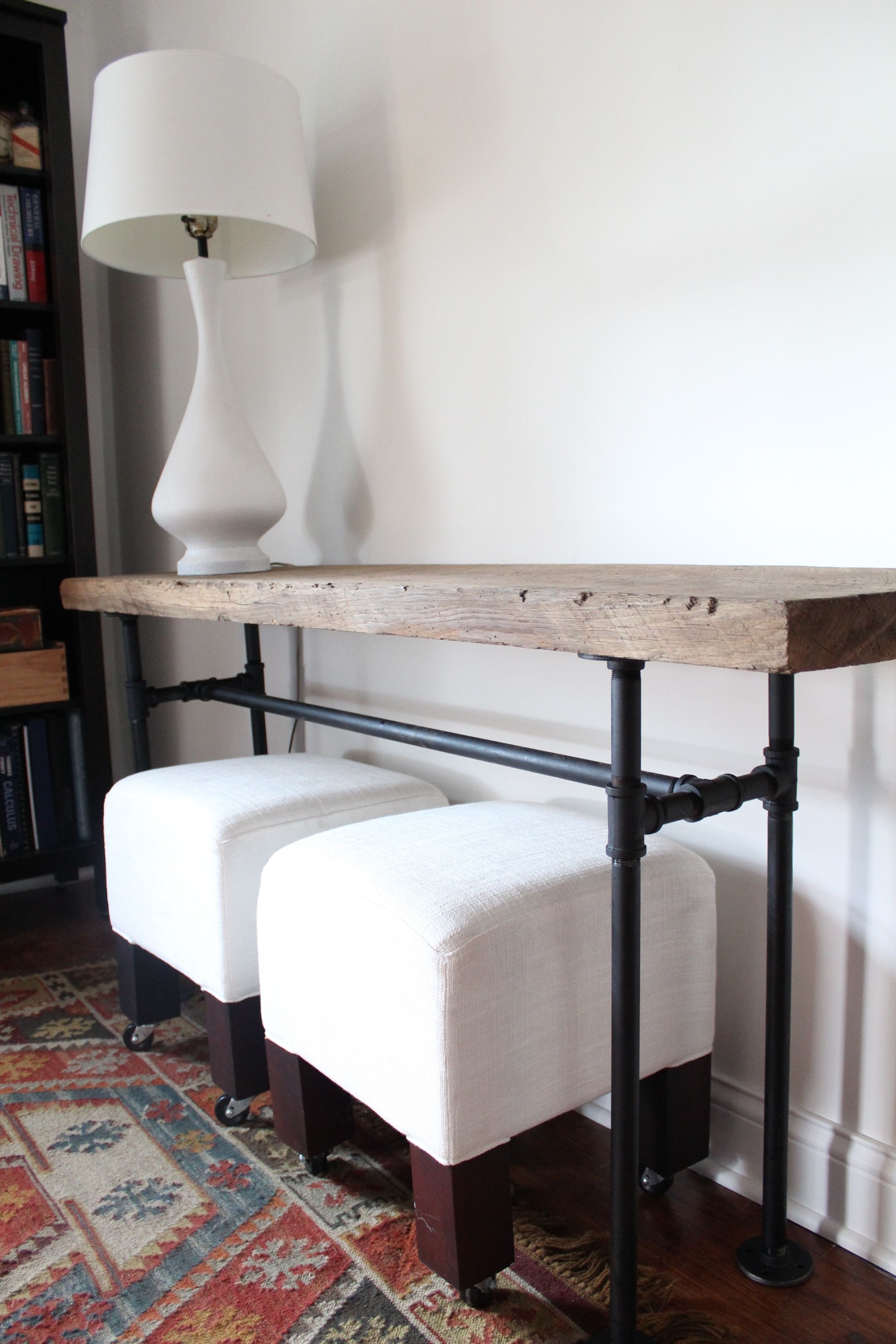 sofa table with stools underneath