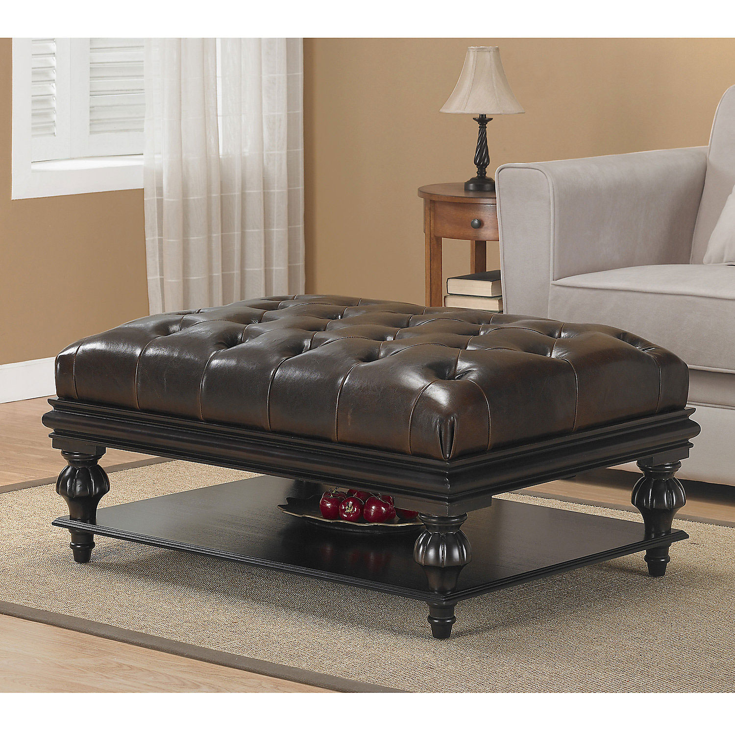Buttontufted leather ottoman with shelf
