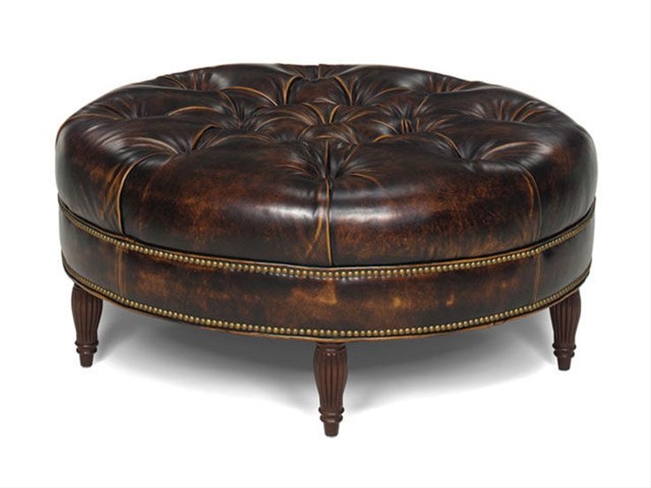 Round tufted leather ottoman