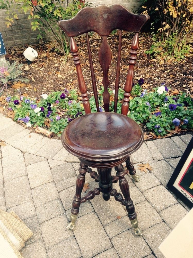 Antique piano stool with swivel seat