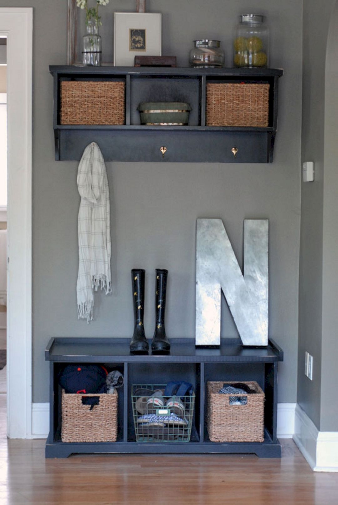 entry shelf with hooks and baskets