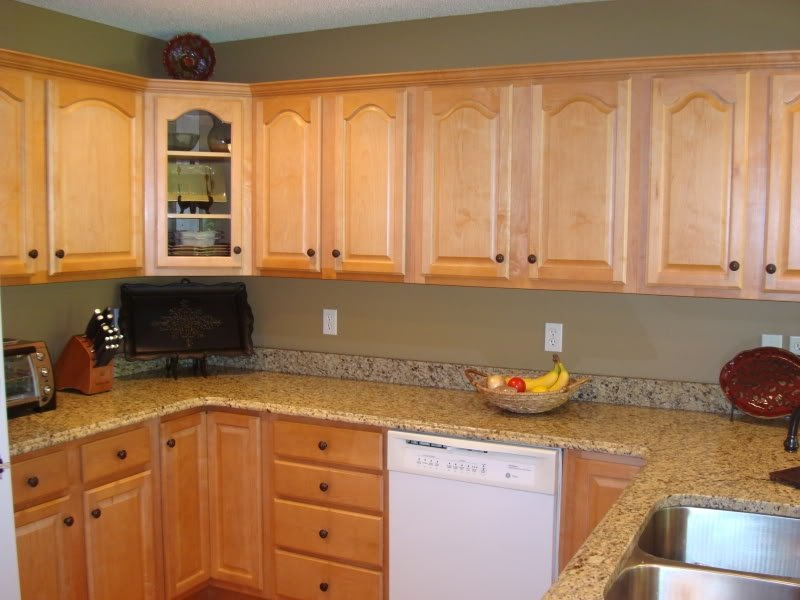 Oak cabinets with stainless appliances