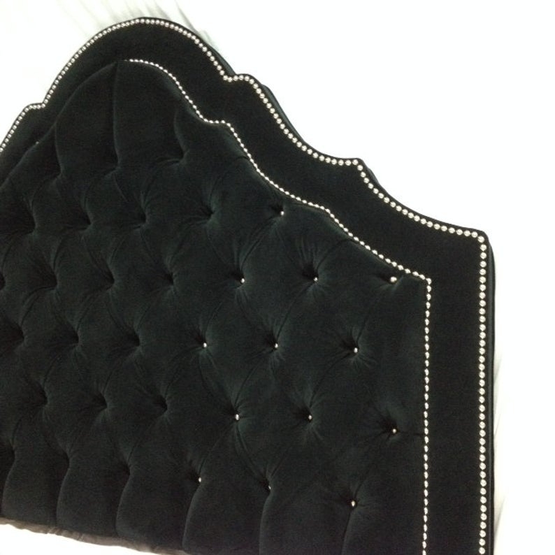Black velvet tufted headboard with