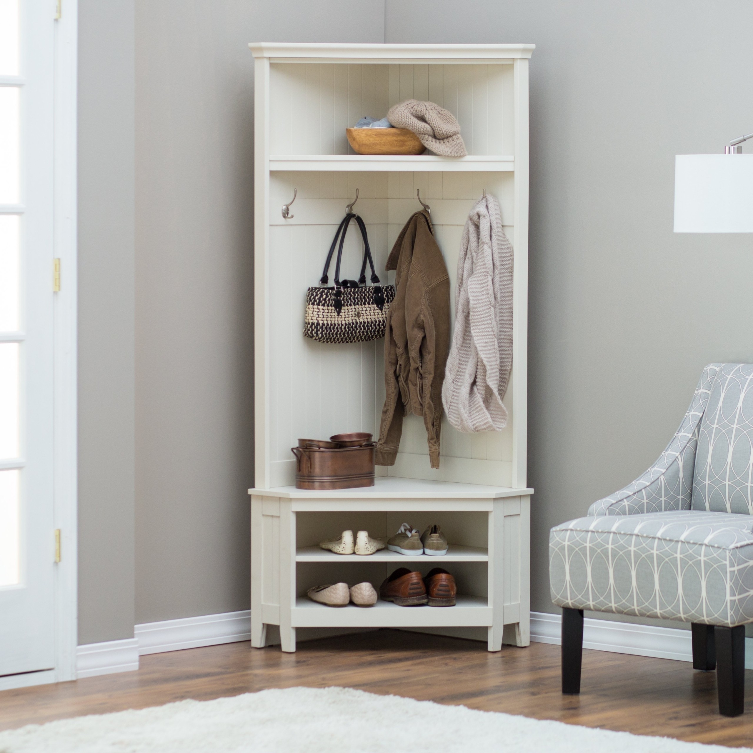 white coat rack with bench