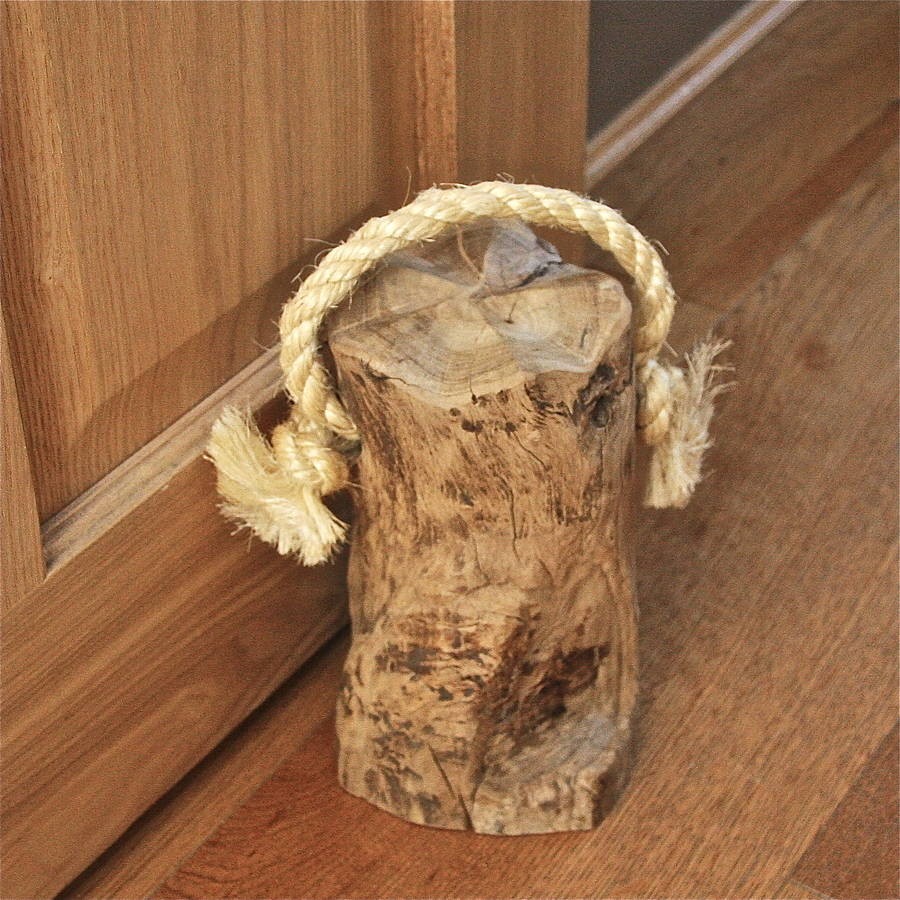 A tree stump makes a great heavy duty door stop