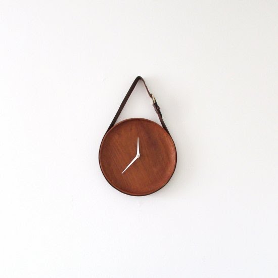 Make this modern clock from a thrifted leather belt and