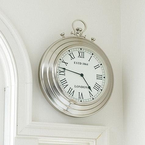 This oversized pocket watch clock brings a fun vintage feel