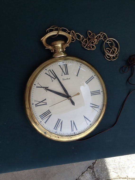 Vintage large brass wall clock pocket