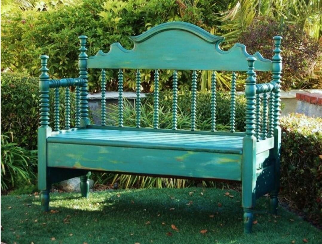 A unique headboard turned bench finished in florence napoleonic blue