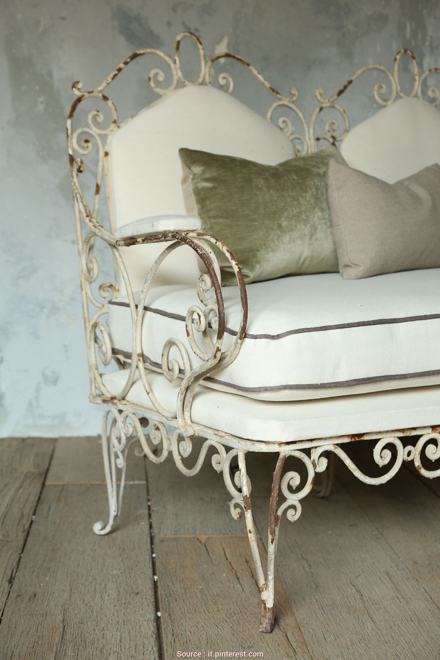 Curved wrought iron bench
