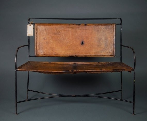 Genuine leather and cast iron bench