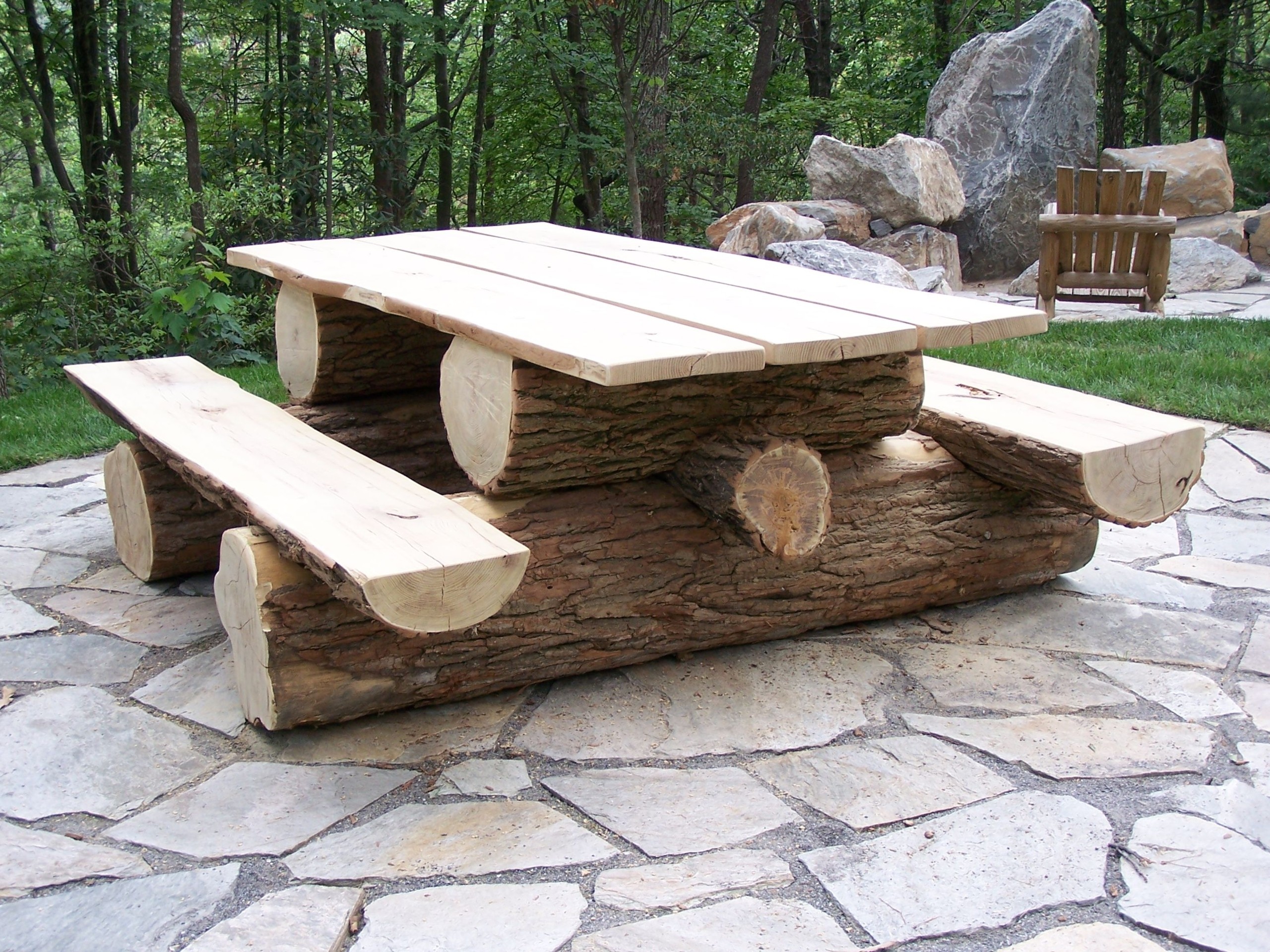 Rustic log store picnic tables