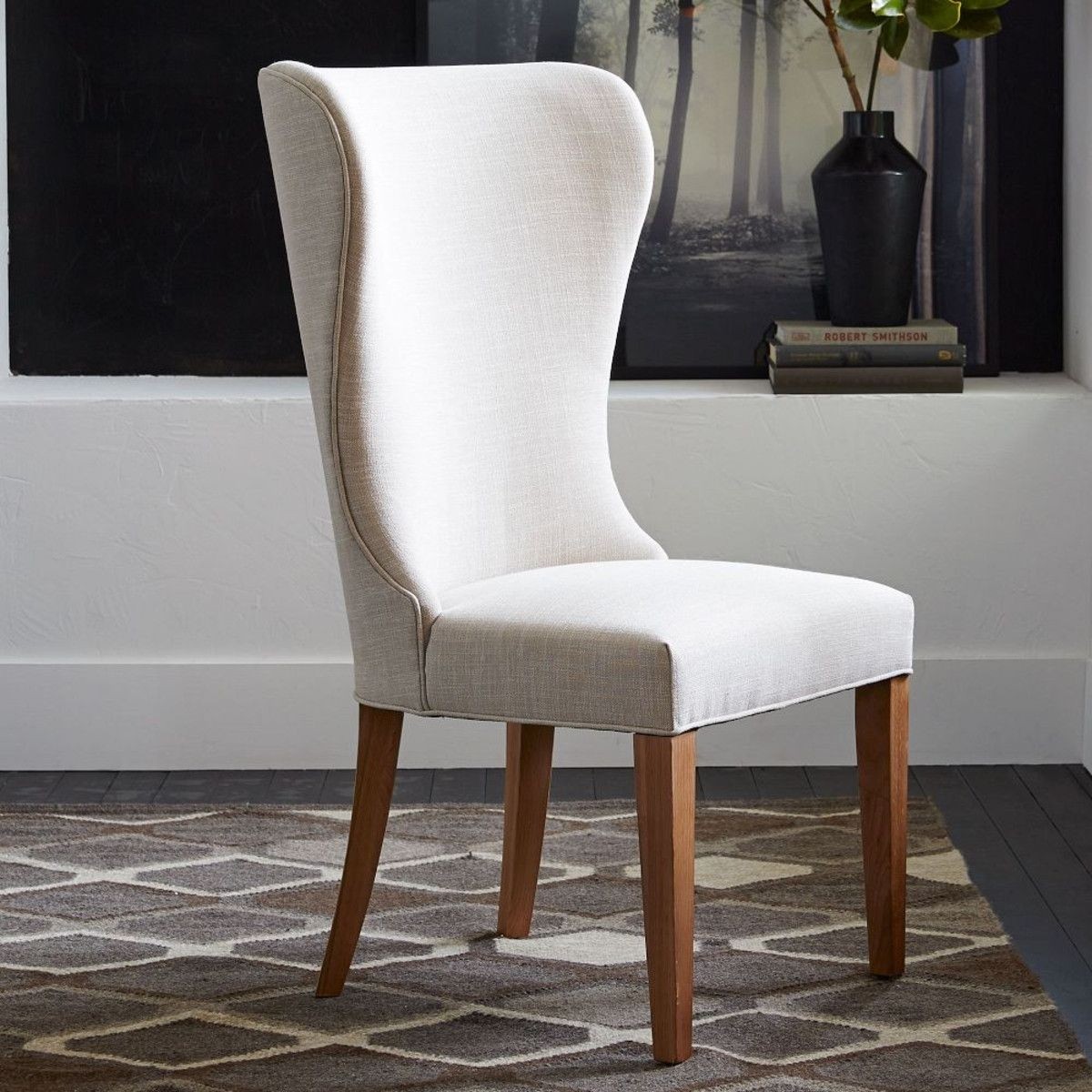 white leather wingback dining chair