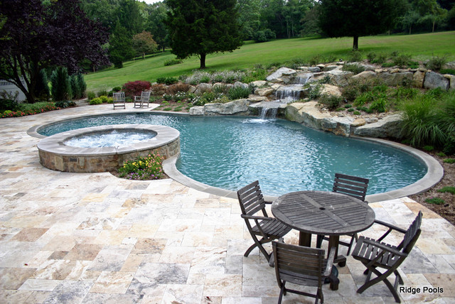 Shaped pool with hot tub