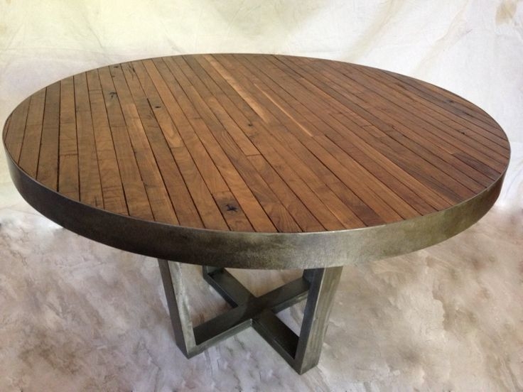 Round industrial rustic table in walnut