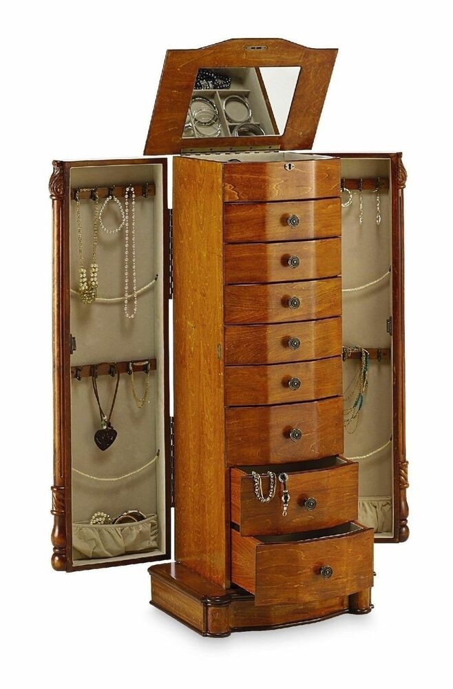 Large Floor Standing 8 Drawer Wooden Jewelry Armoire with Mirror & Lock. Stunning Honey Oak Finish Jewelry Organizer Box W/ Extra Storage. Perfect Cabinet For Your Bedroom, Walk-In Closet, Or Any Room In Your Home
