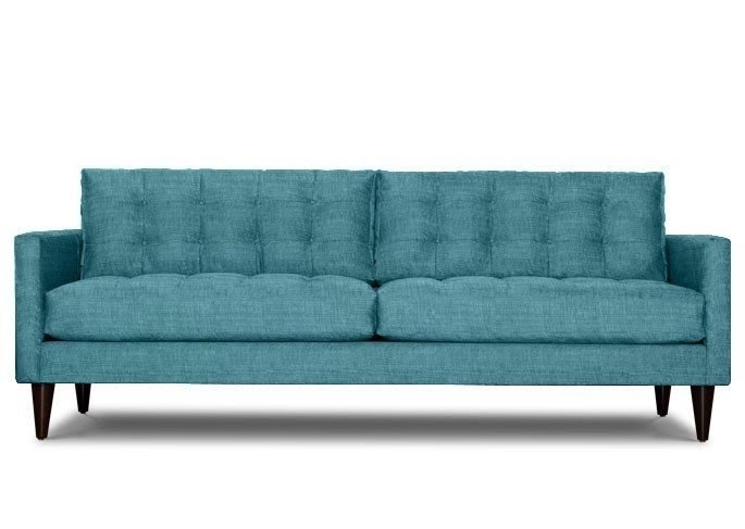 Teal tufted sofa