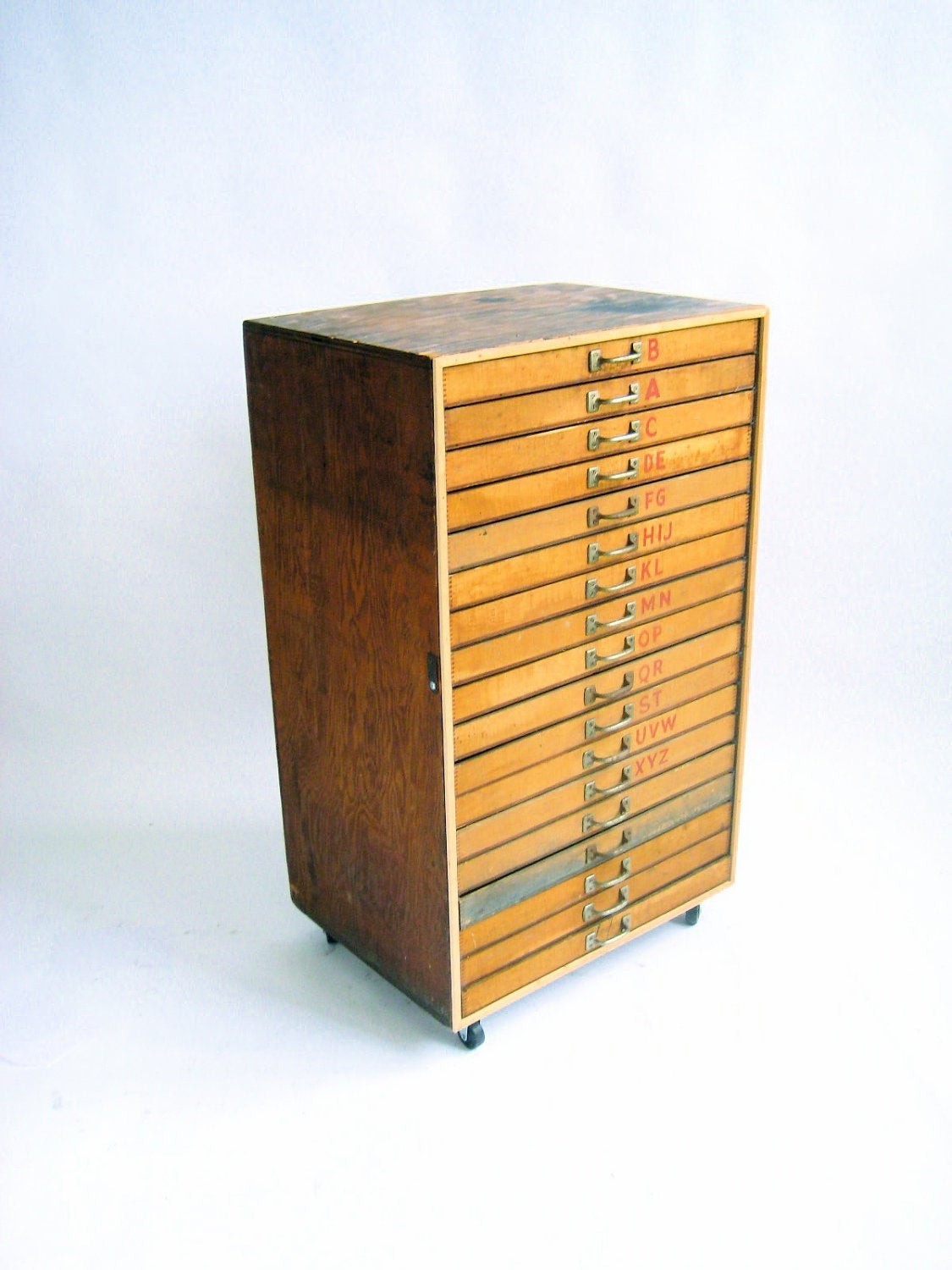 Vintage industrial 18 drawer flat file type cabinet on rolling