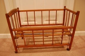 antique baby doll crib on wheels