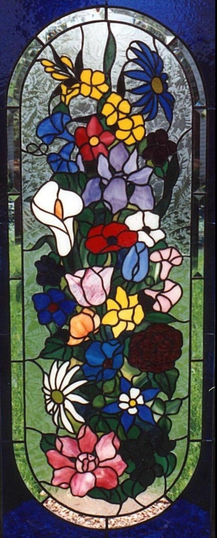 Coloured glass panel