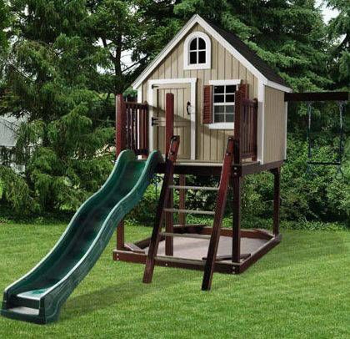 wooden playhouse with slide and swing