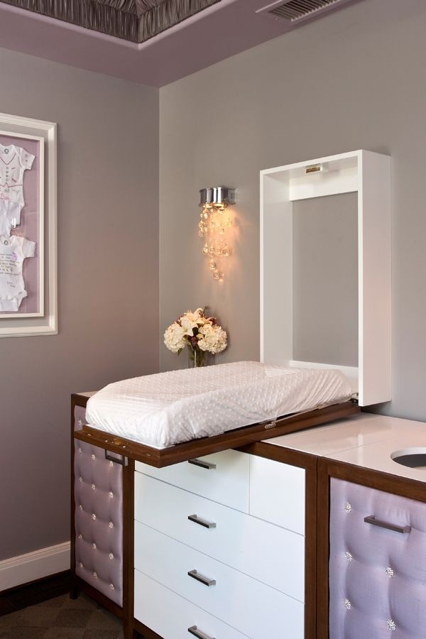 Wall hung changing table