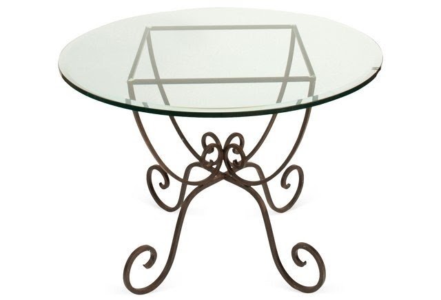 Glass top wrought iron table