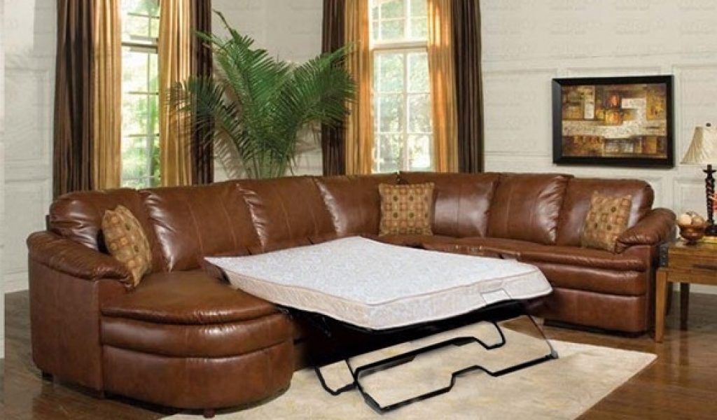Leather sectional with sleeper and recliner