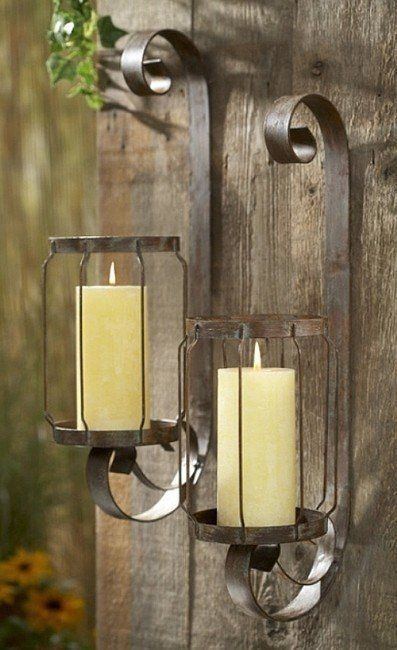 Rustic candle sconces these would work well on the wall