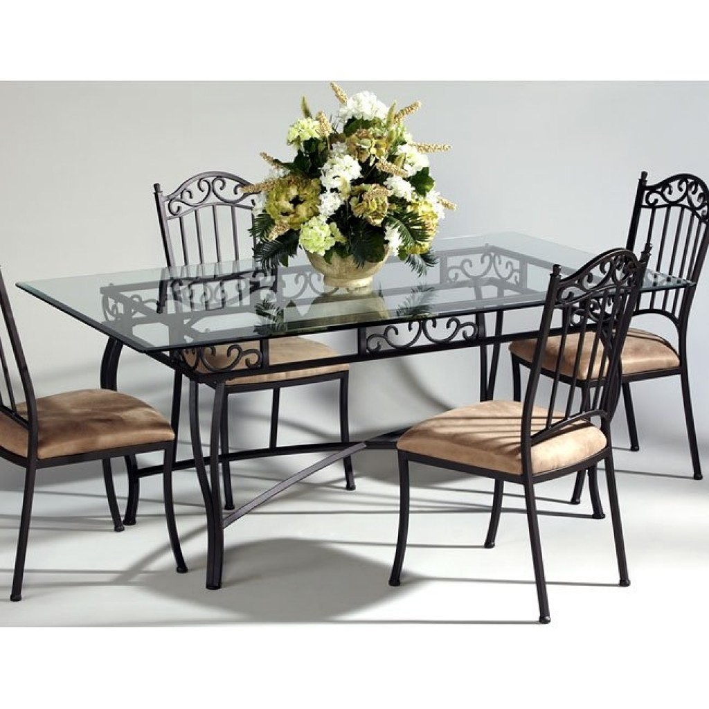 Wrought iron dining tables with glass tops
