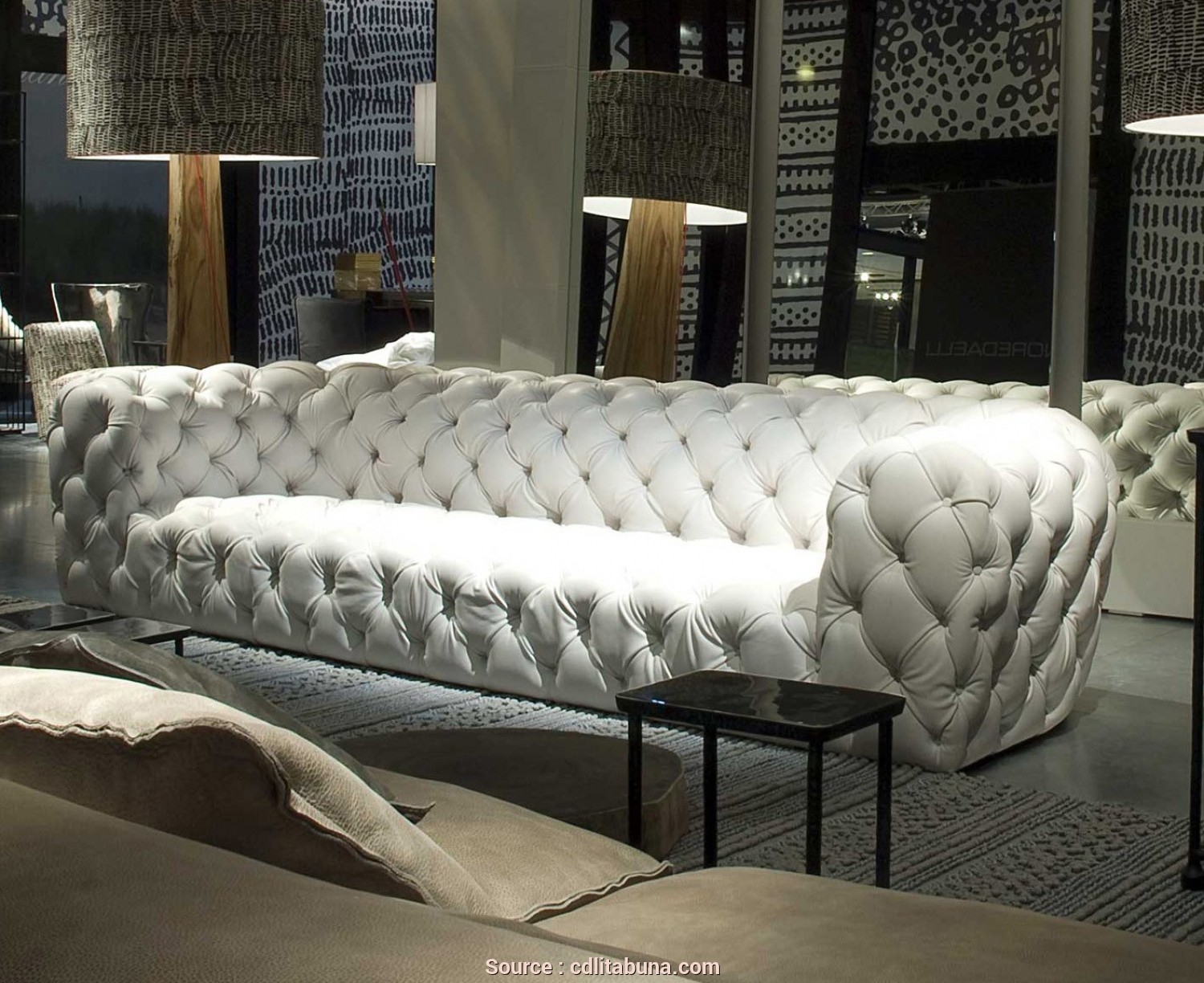 white leather tufted sofa